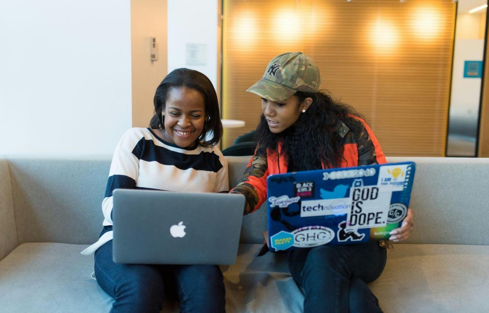 Marketing team analyzing consumer behavior patterns on multiple screens